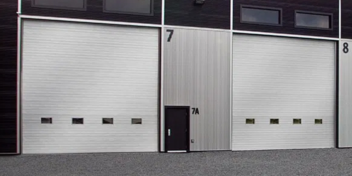 fix bent garage door in German Mills